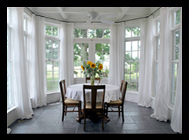 A conservatory addition in Louisa County, Virginia, with bluestone floor and coffered ceiling, in Louisa County, Virginia, by Candace M.P. Smith Architect