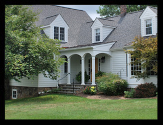 Alterations and additions to residence in Louisa County, Virginia, with new front porch with bluestone paving and custom metal railings, designed by Candace M.P. Smith Architect