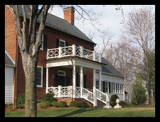 New chippendale porch and brick walkway designed by architect Candace Smith, AIA, for historic home in Albemarle County, Virginia