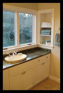 Guest bath addition with custom vanity and towel niche in residence in Charlottesville, Virginia, designed by Candace M.P. Smith Architect