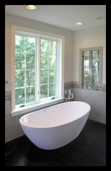 New master suite with free-standing bath tub, custom shower and tile wainscot for residence in Charlottesville, Virginia, designed by Candace M.P. Smith Architect