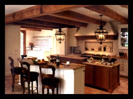 Heavy timber ceiling and new kitchen in addition to Virginia residence, designed by architect Candace Smith, AIA