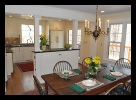 Renovated kitchen with custom island and soapstone counters for residence in Albemarle County, Virginia, designed by Candace M.P. Smith Architect