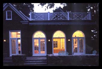 French doors and transoms at new terrace for addition designed by Candace Smith Architect, for artist in Albemarle County, Virginia