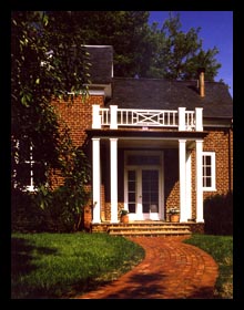 New entry porch and brick walkway designed for addition to historic home in Albemarle County, Virginia, by Candace Smith Architect, PC